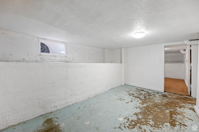 845 Binford St, Ogden, UT 84401 - basement featuring a textured ceiling