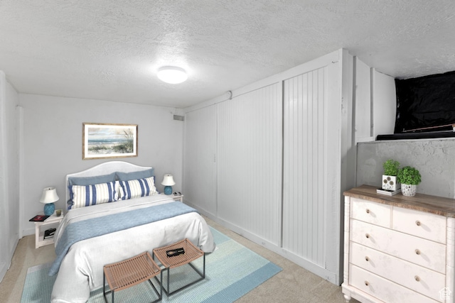 845 Binford St, Ogden, UT 84401 - bedroom with light carpet and a textured ceiling