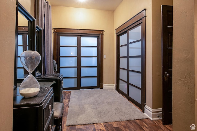 121 T St, Salt Lake City, UT 84103 - entryway with baseboards, a textured wall, and wood finished floors