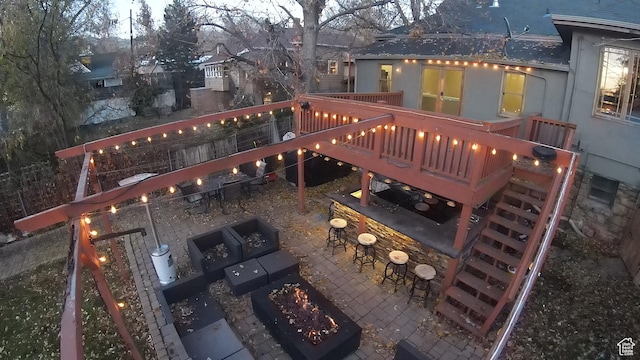 121 T St, Salt Lake City, UT 84103 - wooden terrace featuring stairway, a fire pit, outdoor dry bar, and a patio