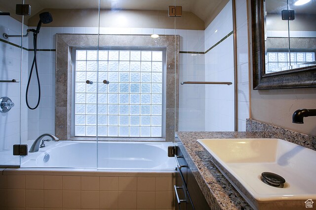 121 T St, Salt Lake City, UT 84103 - bathroom featuring tiled shower / bath combo and vanity