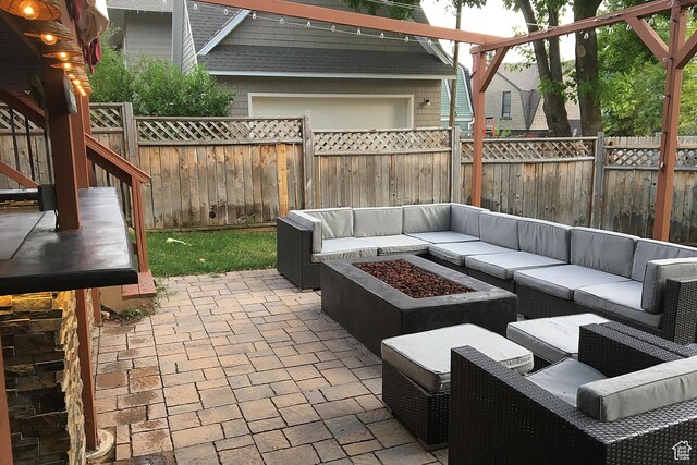 121 T St, Salt Lake City, UT 84103 - view of patio / terrace with an outdoor living space with a fire pit and a fenced backyard