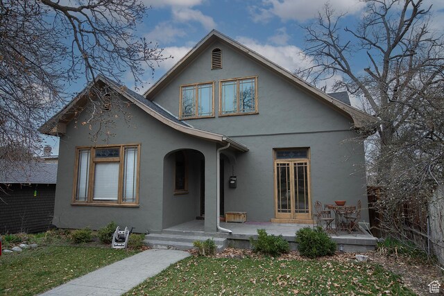 121 T St, Salt Lake City, UT 84103 - bungalow-style house with a front yard and stucco siding