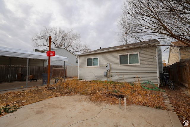 2661 S Melville Dr W, Magna, UT 84044 - rear view of property featuring a patio