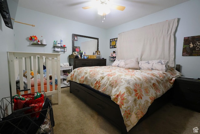 bedroom featuring ceiling fan and carpet floors
