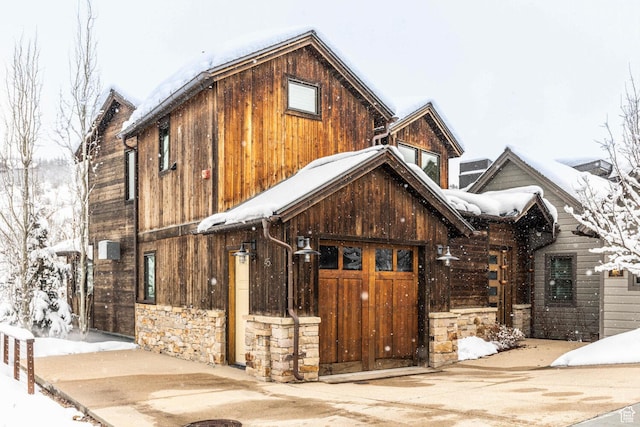 45 King Rd, Park City, UT 84060 - view of front of home with stone siding and concrete driveway