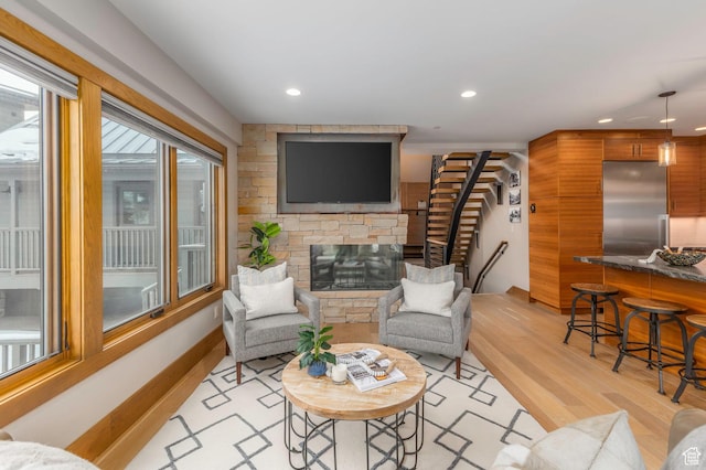 45 King Rd, Park City, UT 84060 - living room with a fireplace, recessed lighting, stairway, and light wood-style flooring