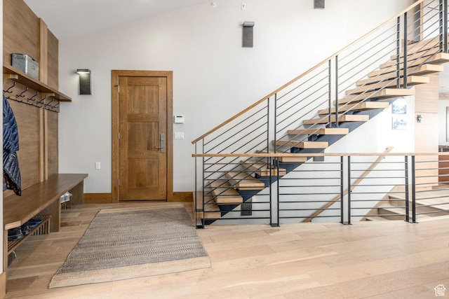 45 King Rd, Park City, UT 84060 - stairway featuring baseboards, vaulted ceiling, and wood finished floors
