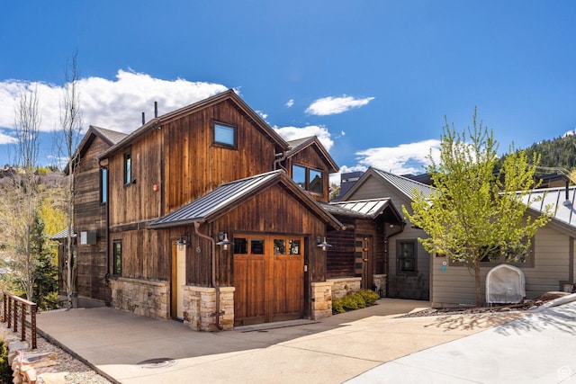 45 King Rd, Park City, UT 84060 - view of front of house featuring stone siding, metal roof, and a standing seam roof