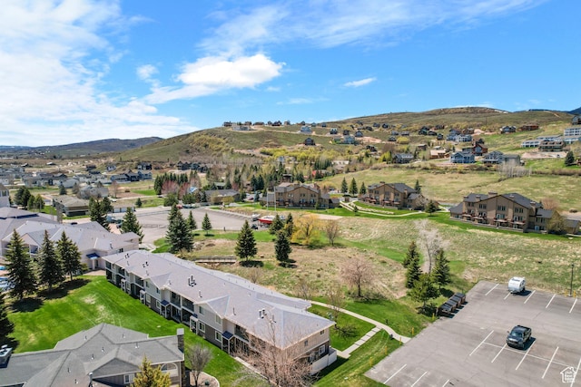 aerial view of residential area with mountains