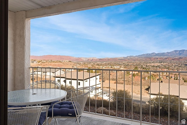 balcony featuring a mountain view