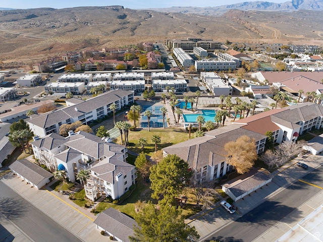 drone / aerial view featuring a mountain view