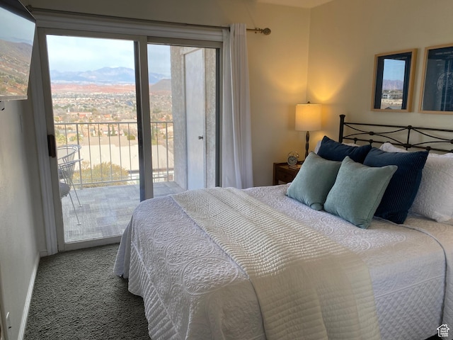 carpeted bedroom with access to outside