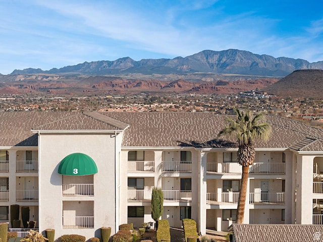 view of building exterior with a mountain view