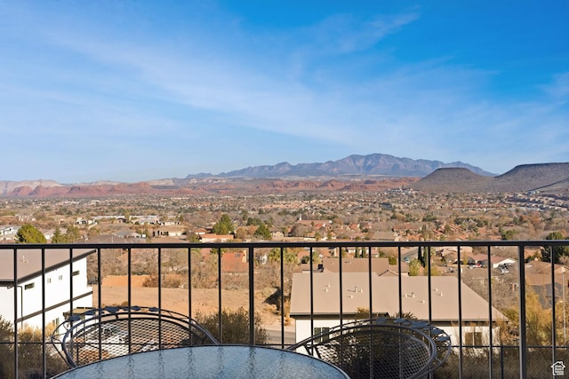 balcony featuring a mountain view
