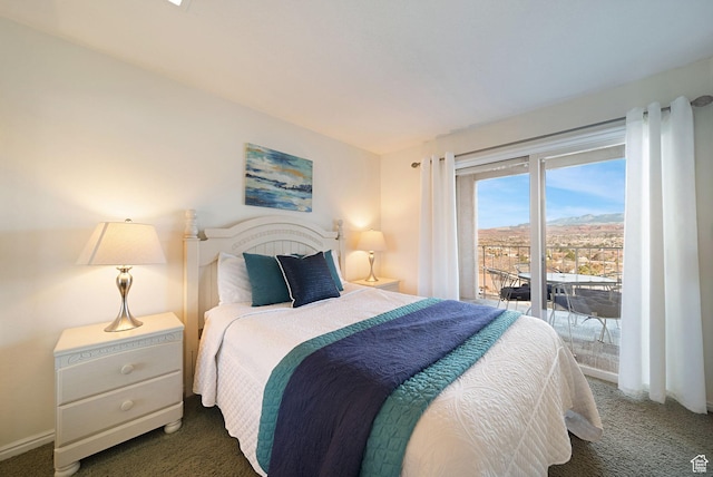 carpeted bedroom featuring access to exterior