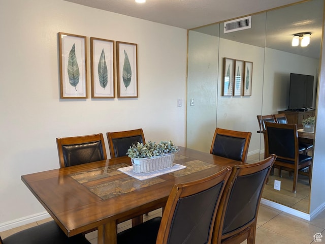 view of tiled dining space