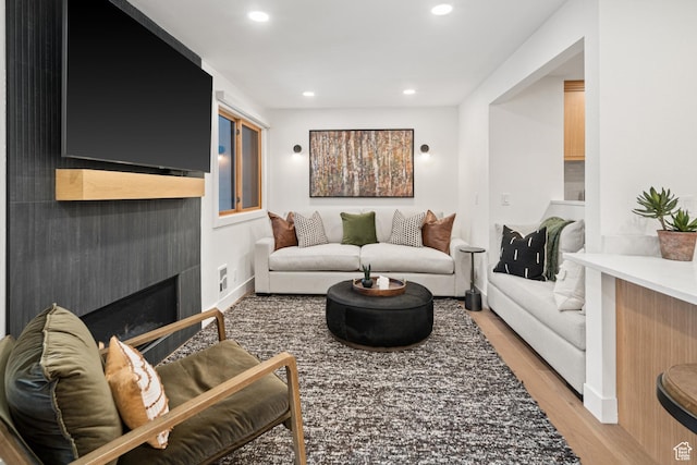 401 Silver King Dr, Park City, UT 84060 - living room with a fireplace and light hardwood / wood-style flooring