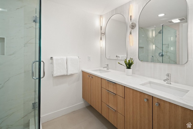 401 Silver King Dr, Park City, UT 84060 - bathroom featuring tile patterned floors, vanity, and a shower with shower door