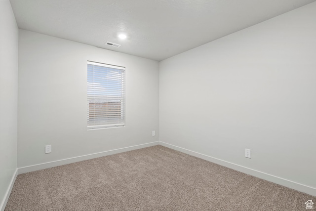 3474 S 3100 W Unit 146, West Haven, UT 84401 - spare room with baseboards, carpet flooring, and visible vents