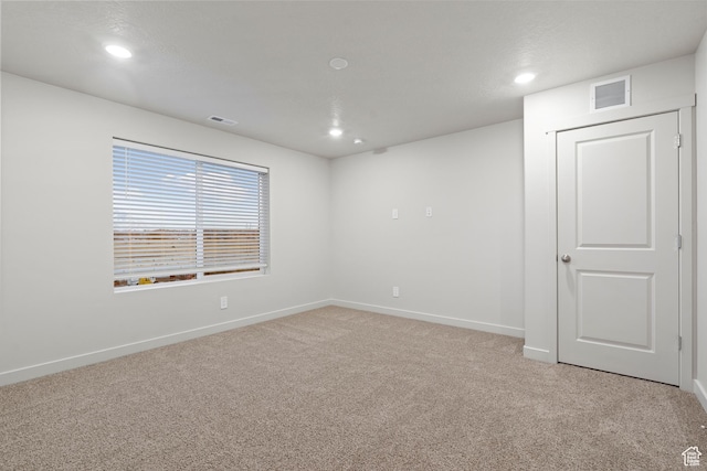 3474 S 3100 W Unit 146, West Haven, UT 84401 - unfurnished room with visible vents, recessed lighting, baseboards, and light colored carpet