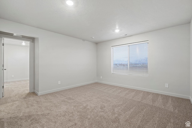 3474 S 3100 W Unit 146, West Haven, UT 84401 - unfurnished room with carpet floors, baseboards, and visible vents