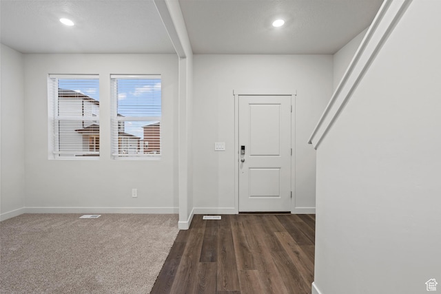 3474 S 3100 W Unit 146, West Haven, UT 84401 - entryway with baseboards, dark wood-style flooring, recessed lighting, and visible vents