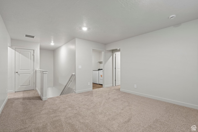 3474 S 3100 W Unit 146, West Haven, UT 84401 - spare room featuring baseboards, washer and dryer, carpet floors, and visible vents