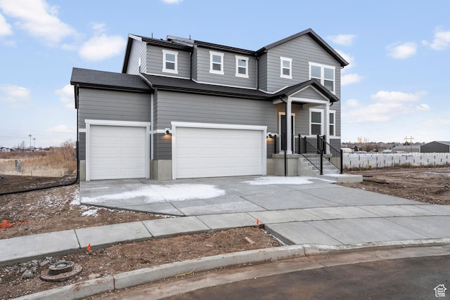 3474 S 3100 W Unit 146, West Haven, UT 84401 - view of front facade featuring an attached garage and driveway