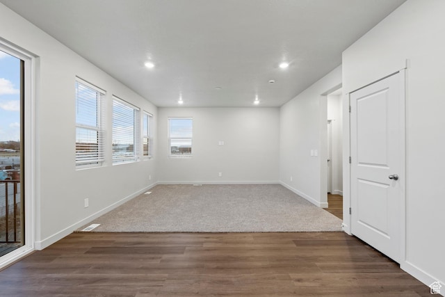 3474 S 3100 W Unit 146, West Haven, UT 84401 - spare room with baseboards, recessed lighting, and wood finished floors