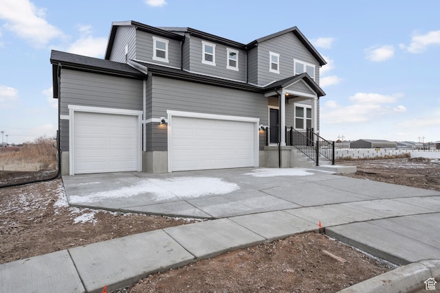 3474 S 3100 W Unit 146, West Haven, UT 84401 - view of front facade with an attached garage and concrete driveway