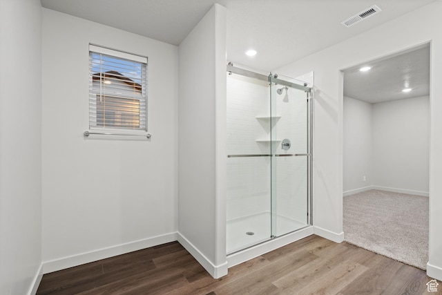 3474 S 3100 W Unit 146, West Haven, UT 84401 - bathroom with baseboards, a shower stall, wood finished floors, and visible vents