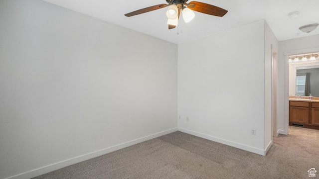 1026 N Shepard Creek Pkwy Unit 4, Farmington, UT 84025 - unfurnished room featuring ceiling fan, sink, and light carpet