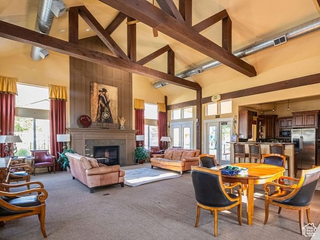 1026 N Shepard Creek Pkwy Unit 4, Farmington, UT 84025 - living room featuring beamed ceiling, light colored carpet, high vaulted ceiling, and french doors