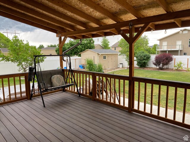 454 S Lincolnshire W, Kaysville, UT 84037 - wooden terrace featuring a shed and a lawn