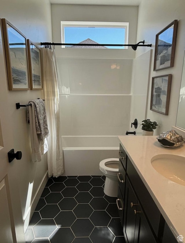 full bathroom featuring toilet, tile patterned flooring, shower / bathtub combination with curtain, and a healthy amount of sunlight