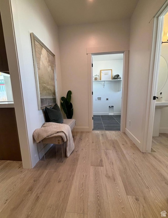 hallway featuring light hardwood / wood-style flooring
