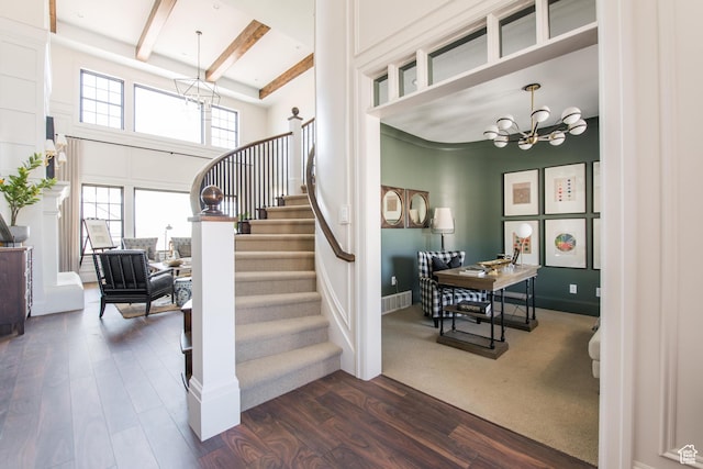 1165 N 360 E Unit 75, Salem, UT 84653 - stairway with an inviting chandelier, beam ceiling, wood-type flooring, and a high ceiling