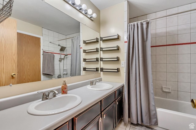 full bathroom featuring shower / tub combo with curtain, tile patterned flooring, and double vanity