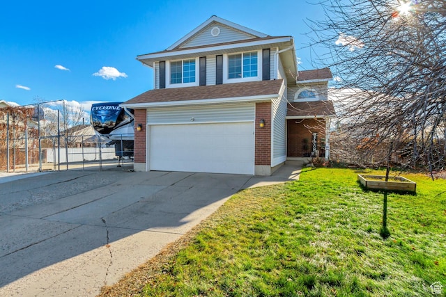 view of front property with a garage and a front lawn