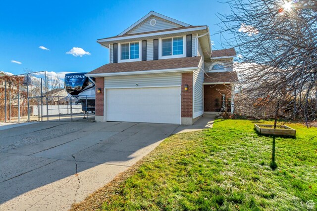 3103 W Meadow Green Way S, West Jordan, UT 84088 - traditional home featuring a garage, concrete driveway, and brick siding