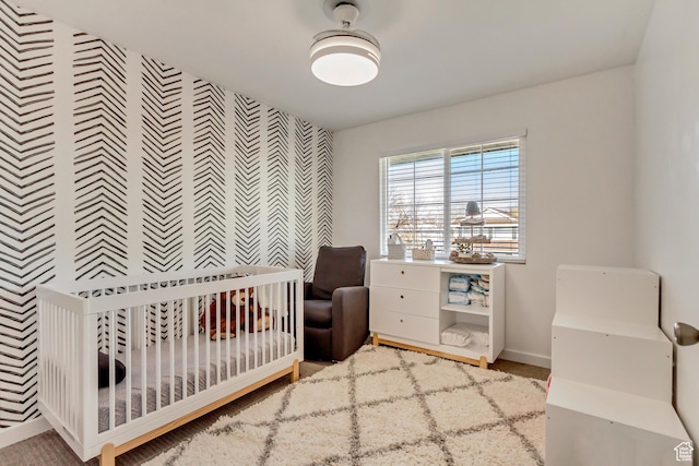 3103 W Meadow Green Way S, West Jordan, UT 84088 - carpeted bedroom featuring an accent wall and a crib