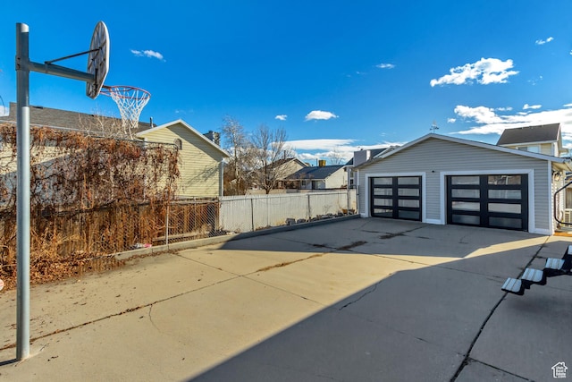 detached garage with fence