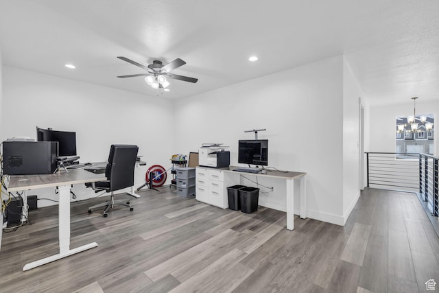13963 S Wide Ridge Way Unit 1121, Herriman, UT 84096 - home office featuring ceiling fan with notable chandelier and light hardwood / wood-style floors