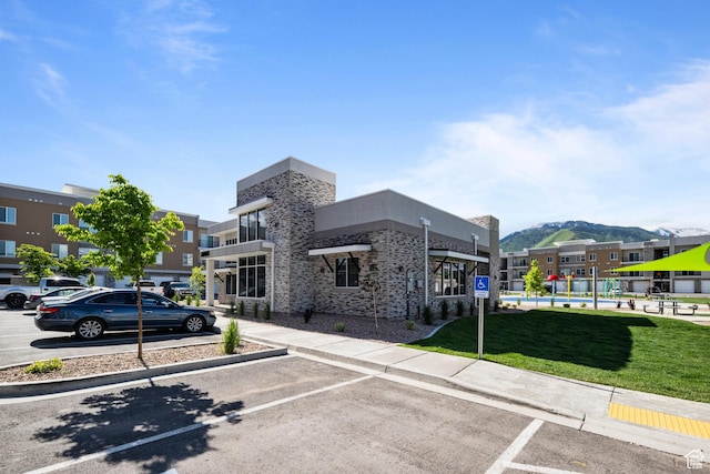 2303 E 830 S Unit 8, Spanish Fork, UT 84660 - view of vehicle parking featuring a mountain view and a yard