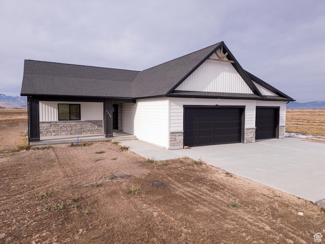 ranch-style house featuring a garage