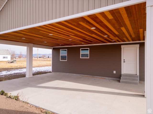 view of patio featuring a carport