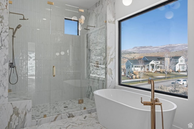 3050 Country Crossings, Heber City, UT 84032 - bathroom with a stall shower, a soaking tub, and a mountain view