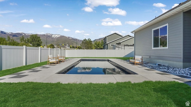 928 N Foxhunter Dr W, Farmington, UT 84025 - view of swimming pool with a mountain view and a patio area