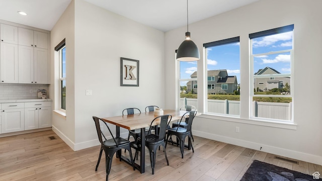 928 N Foxhunter Dr W, Farmington, UT 84025 - dining space featuring healthy amount of natural light, light wood finished floors, baseboards, and recessed lighting